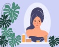 Young woman is doing her beauty routine. Royalty Free Stock Photo