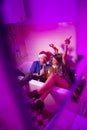 Couple singing using shower as mike at New Year`s Eve house party Royalty Free Stock Photo