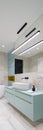 Bathroom with modern blue cabinets, vertical panorama Royalty Free Stock Photo