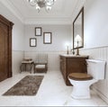 Bathroom in modern style with sink bath and toilet with a comfortable chair.