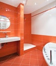 Bathroom in orange and white colors Royalty Free Stock Photo