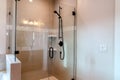 Bathroom rectangle shower stall with half glass enclosure and hinged door