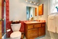 Bathroom with red tile wall trim Royalty Free Stock Photo