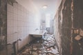 Bathroom renovation - removing tiles in old apartment bathroom Royalty Free Stock Photo