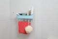 Bathroom shelf with bathroom accessories against the tile wall Royalty Free Stock Photo