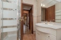 Bathroom with shower cabin with sink cabinet with marble top Royalty Free Stock Photo