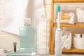 Bathroom with sonic electric toothbrush, toothpaste, mouthwash, dental floss and tongue cleaner Royalty Free Stock Photo