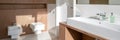 Bathroom with square toilet and bidet, panorama Royalty Free Stock Photo