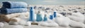 A bathroom table is topped with various colorful shampoo bottles arranged neatly, surrounded by soft bubbles, creating a Royalty Free Stock Photo