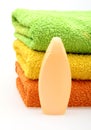 Bathroom towels and bottle of soap Royalty Free Stock Photo