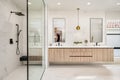 this bathroom has two large sinks and marble counters and glass shower doors Royalty Free Stock Photo