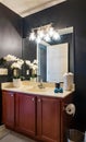 Black Bathroom with Cherry Vanity Royalty Free Stock Photo