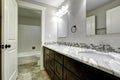 Bathroom vanity cabinet with white granite top