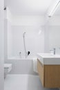 Bathroom in white and grey tiles Royalty Free Stock Photo