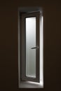 Bathroom window with frosted glass, light shining though but can not see though, privacy. Royalty Free Stock Photo