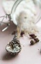 Bathsalt and a spoon in wood Royalty Free Stock Photo