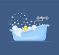 Bathtub with duck. Baby shower, tub with yellow cartoon toy and foam. Soap bubbles, funny hygiene concept. Bathroom