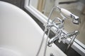 Bathtub with faucet and shower in bathroom Royalty Free Stock Photo