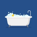 Bathtub with foam bubbles inside and bath yellow rubber duck isolated on blue background. Bath time in flat style