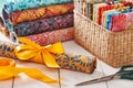 Batik kits turned into rolls tied with a decorative bow