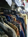Batik shirts hanged in a cupboard Royalty Free Stock Photo
