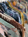 Batik shirts hanged in a cupboard Royalty Free Stock Photo
