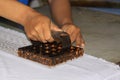 Batik wax stamp process in Winotosastro factory in Yogyakarta, Java, Indonesia