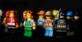 Batman and other Lego minifigures on black background Royalty Free Stock Photo