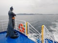 Batman statue t on ferry boat deck Royalty Free Stock Photo