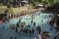 People bathe in cold and clean rocky mountain spring water river Royalty Free Stock Photo