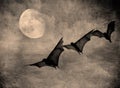 Bats in the dark cloudy sky, halloween background