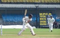 Batsman hitting sixer. Royalty Free Stock Photo