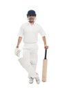 Batsman standing with a cricket bat Royalty Free Stock Photo