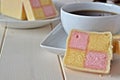 Battenberg cake with a cup of tea Royalty Free Stock Photo