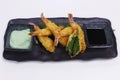 Batter fried tempura shrimps with wasabi mayonnaise and soy sauce, Japanese food specialty Royalty Free Stock Photo