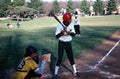 A batter in a high school softball game