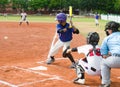 Batter about to hit the ball