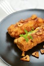 Battered and fried cod fillets Royalty Free Stock Photo