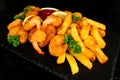 Battered King Prawns And Chips meal