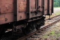 Battered railway wagon standing on the tracks Royalty Free Stock Photo