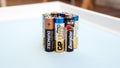 Batteries for devices. Alkaline finger batteries Duracell, Energizer and GP, copyspace. Editorial Ukraine 12.02.2023