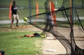 Yellow Ball Goes Into Batters Practice Net Royalty Free Stock Photo