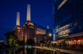 Battersea, London, UK: Battersea Power Station at night with people