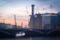 Battersea Power Station and Battersea Railway Bridge at sunrise Royalty Free Stock Photo