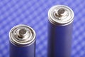 Battery on blue background