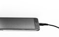 Battery Charger cable connect to smart phone Royalty Free Stock Photo