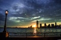 Magical Sunset over Jersey City, seen from the Battery Park in Manhattan, New York City Royalty Free Stock Photo