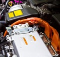 Battery and hybrid engine