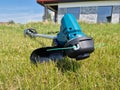 Battery powered electric grass trimmer