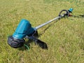 Battery powered electric grass trimmer Royalty Free Stock Photo